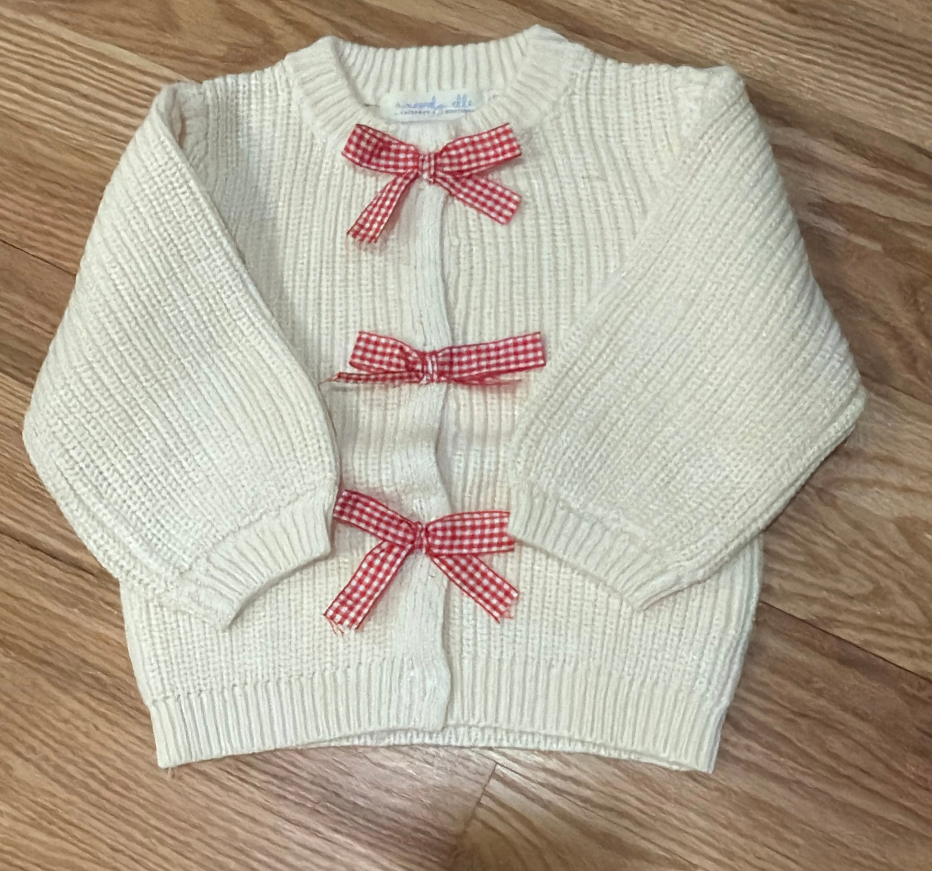 Cream Cardigan with Ribbon Bows